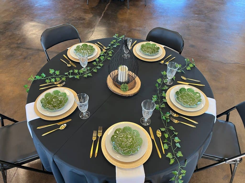 Black and gold table setting for a New Year's Eve party at Connection Room in Cottonwood AZ