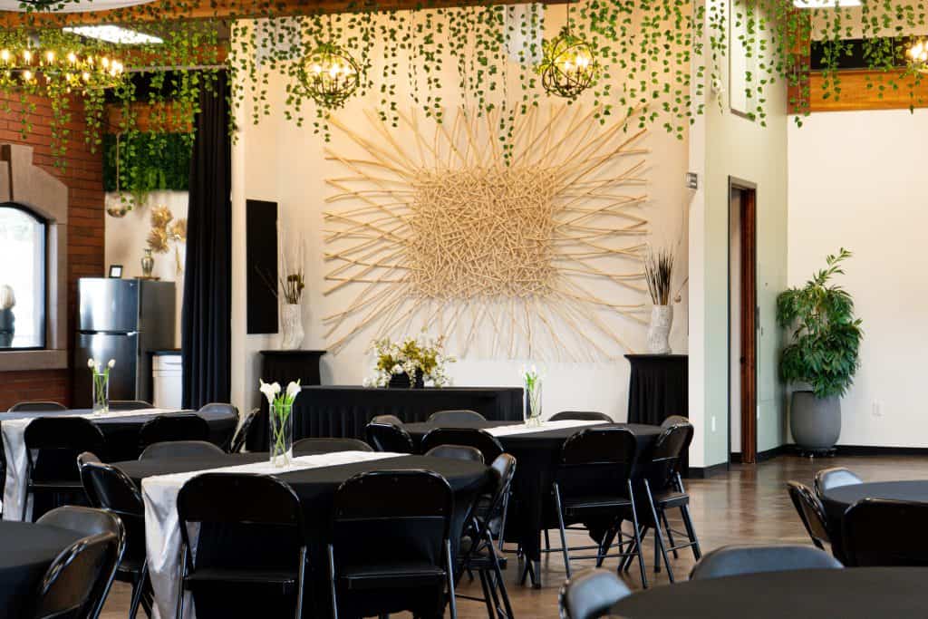 Connection Room event space in Cottonwood AZ with sunburst wall and tables set for a shower